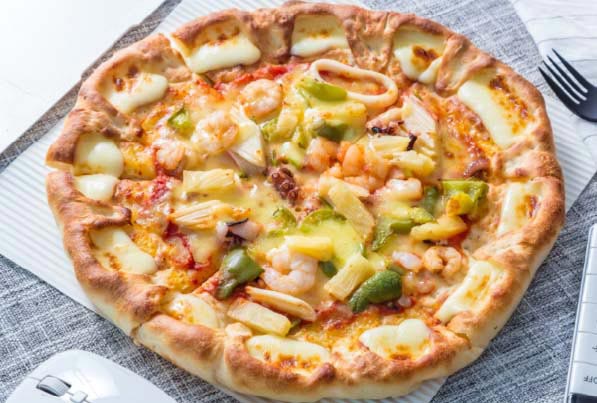 How does inactive dry yeast improve dough relaxation?